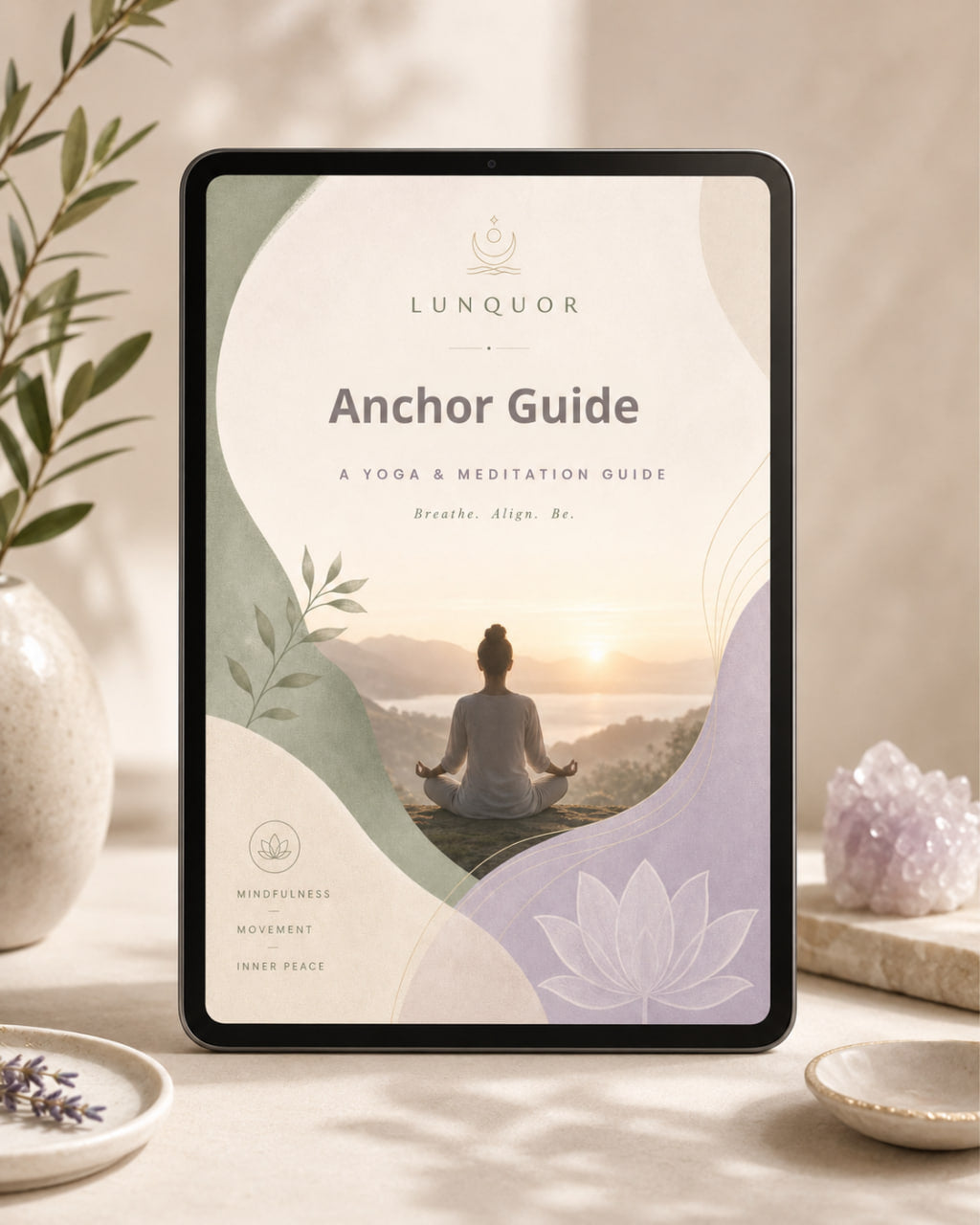 Tablet displaying a 'Lunquor Anchor Guide' on a serene setting with a person meditating.